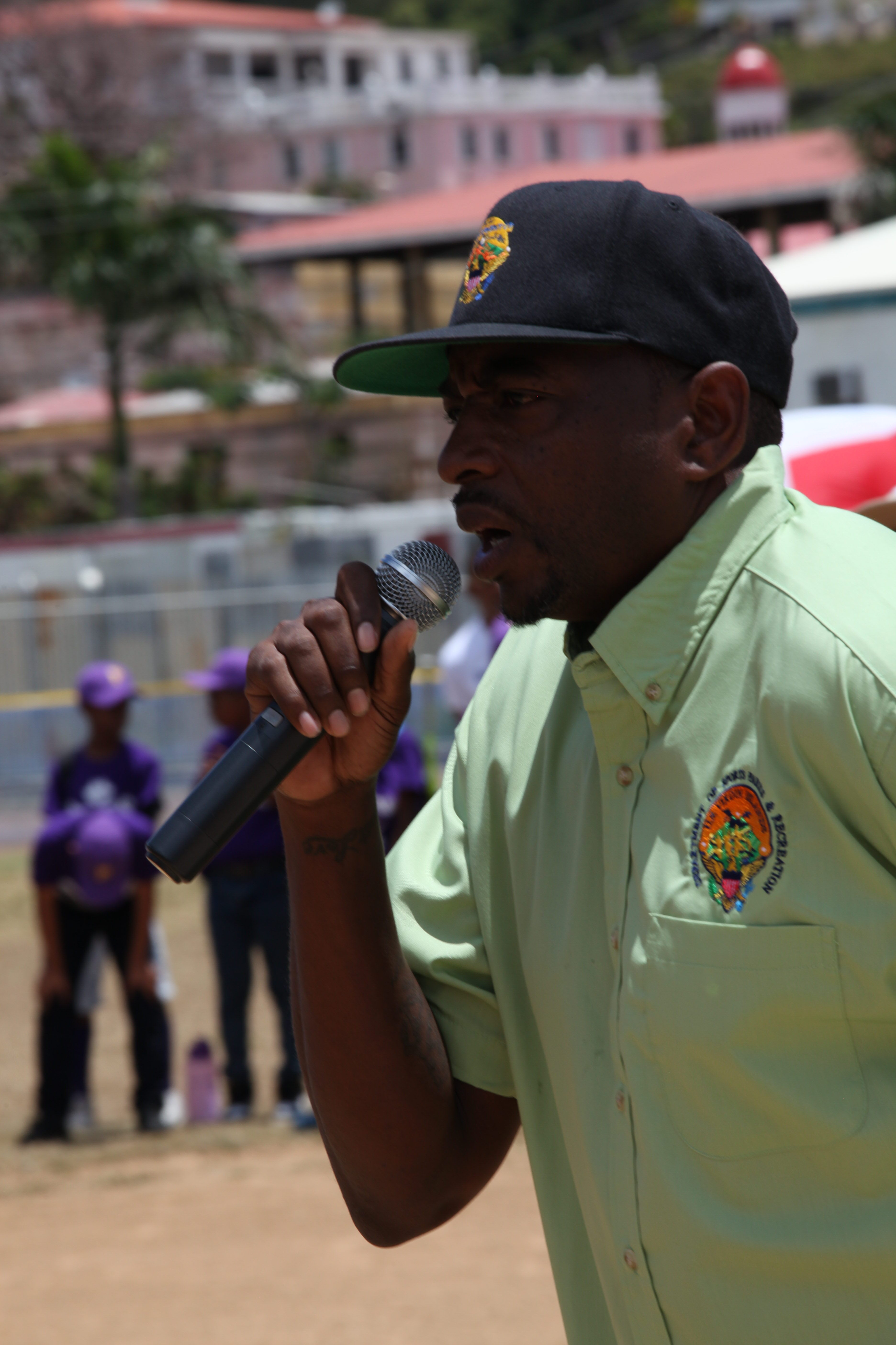 Calvert White speaks during Little League opening ceremonies at Griffith Ballpark in St. Thomas.